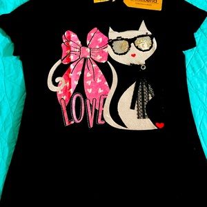 Polo de piedreria y lentejuelas NUEVO no cambios